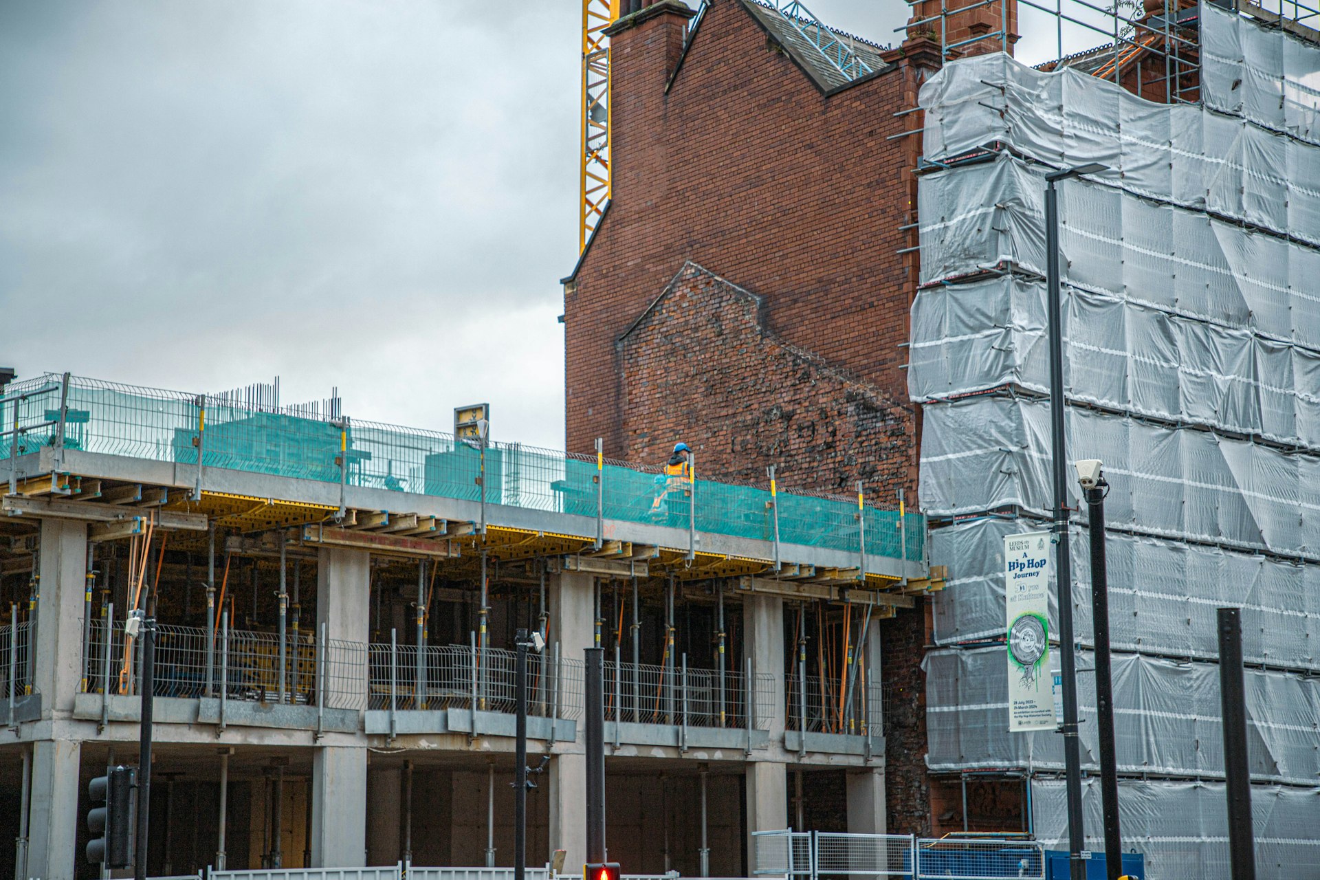 UK building under construction with scaffolding on site